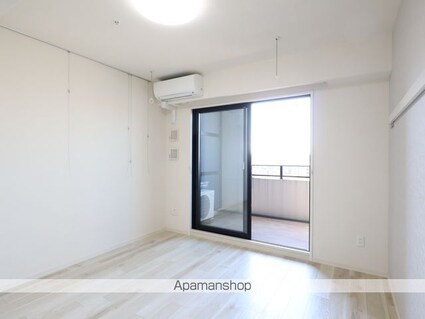 ＧＲＡＮＤ　ＥＳＰＯＩＲ　ＩＺＵＭＩ[1K/28.76m2]のリビング・居間