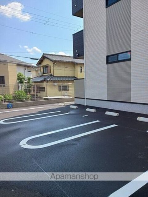 ハーモニーハウス[1K/28.87m2]の駐車場