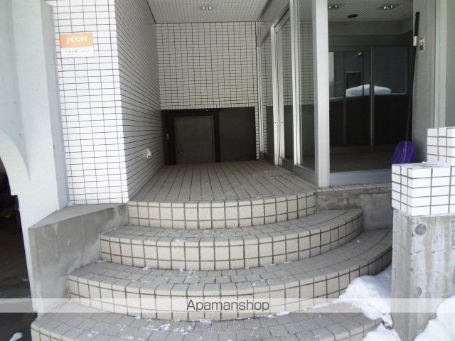 エムズアパートメントの玄関写真