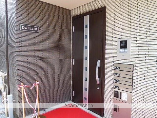 DWELL 結 ドゥウェルムスブの玄関写真