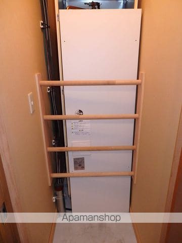 帯広市 3階建 築20年の玄関写真