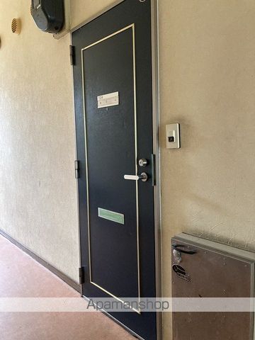 プレジール紫竹山の玄関写真
