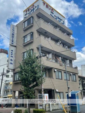 ニッサンビルの玄関写真