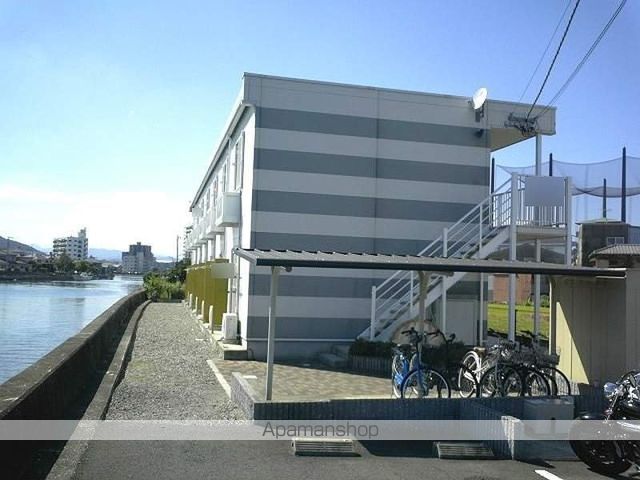 レオパレスウインドワード 金剛の玄関写真