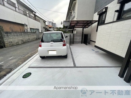 Ｔフラット道後一万[1LDK/33.27m2]の駐車場