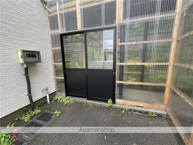 ロジメント純の玄関写真