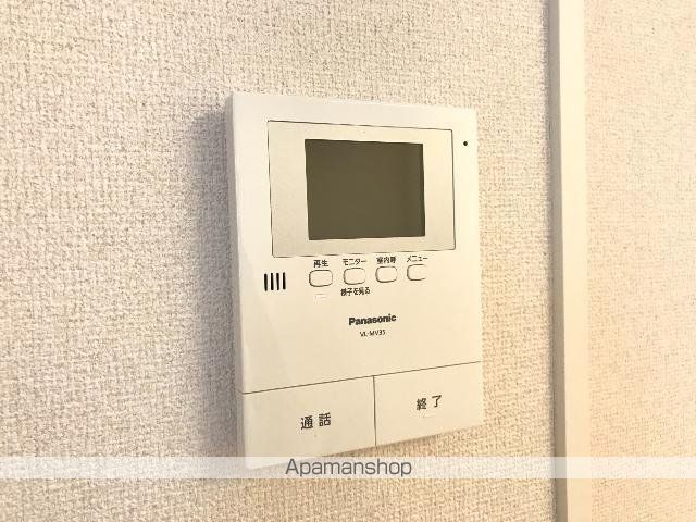 REプロニティB棟の玄関写真