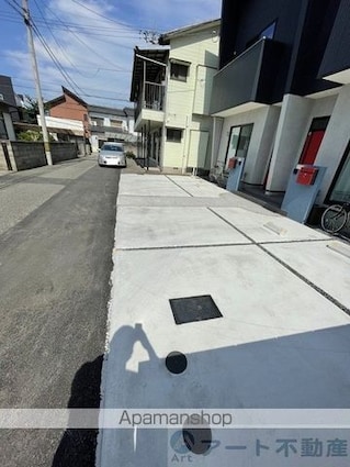 アヴェニュー拓川[2LDK/60.45m2]の駐車場1