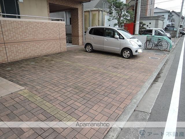 ブラウンハイム朝生田[1K/21.38m2]の駐車場