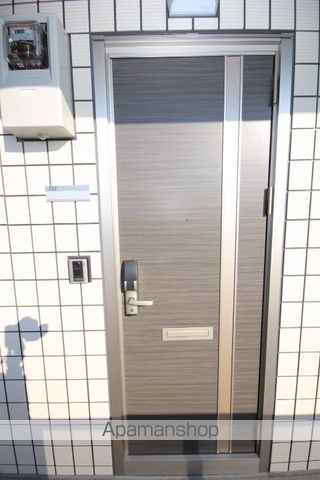 都城市 2階建 築11年の玄関写真