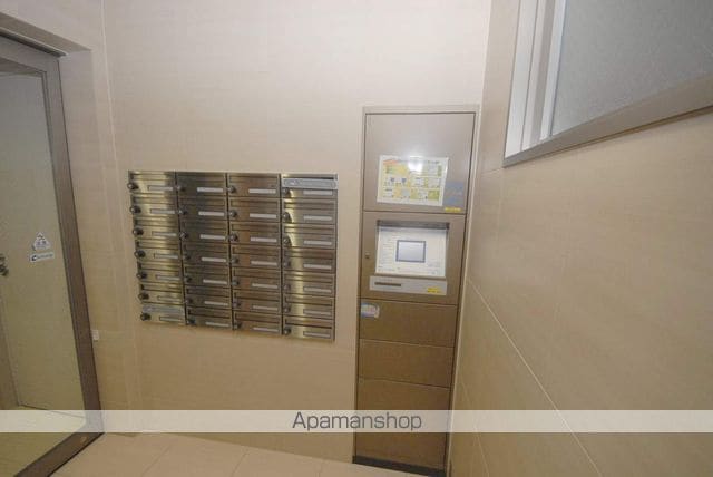 プラウド加治屋21の玄関写真