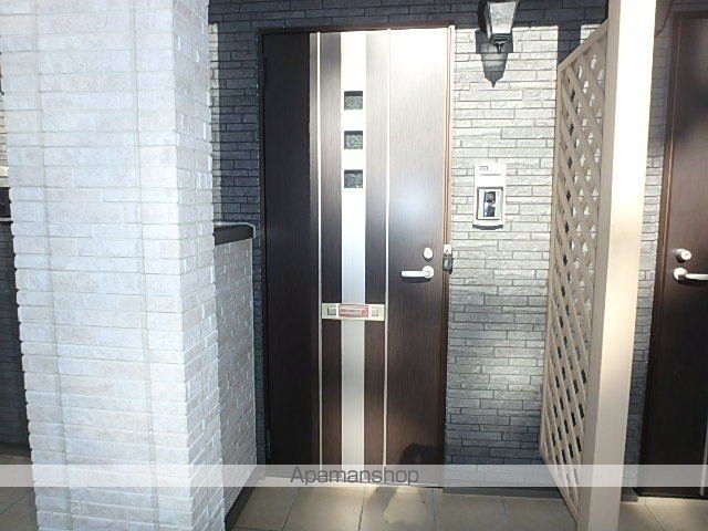 塩尻市 2階建 築8年の玄関写真