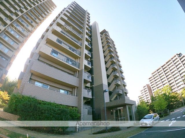 新千里桜ヶ丘メゾンシティ壱番館の外観写真