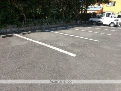 ベルメゾン[1K/21.46m2]の駐車場1