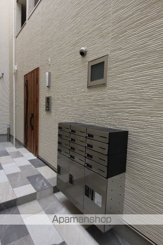 クリエオーレ蛍池北町IIの玄関写真