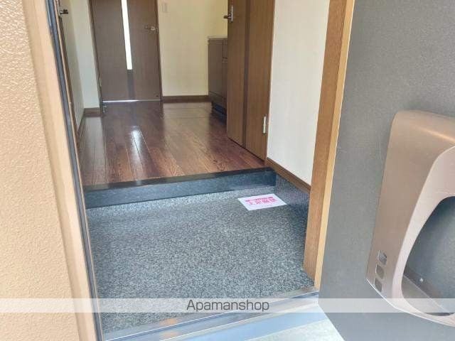 プチメゾン辰の玄関写真