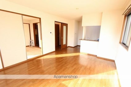 グリーンハイツ木太Ａ・Ｂ・Ｃ・Ｄ棟[2LDK/61.6m2]のリビング・居間