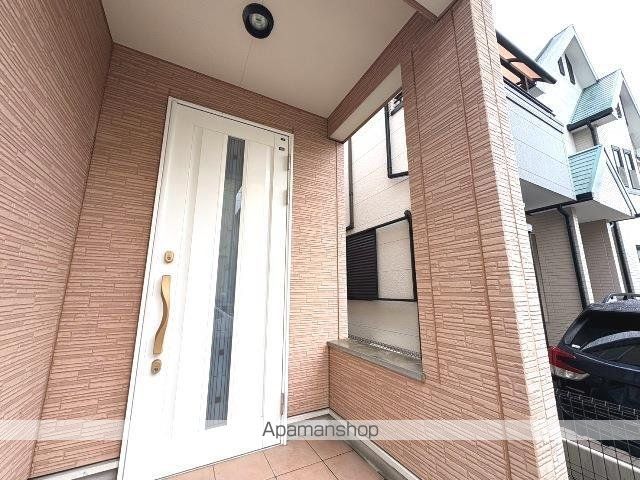 岸和田市 2階建 築23年の玄関写真