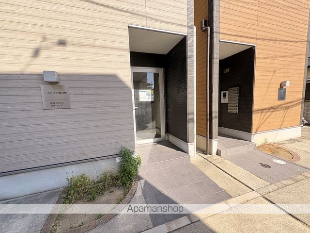 ハーモニーテラス淀下津町の玄関写真