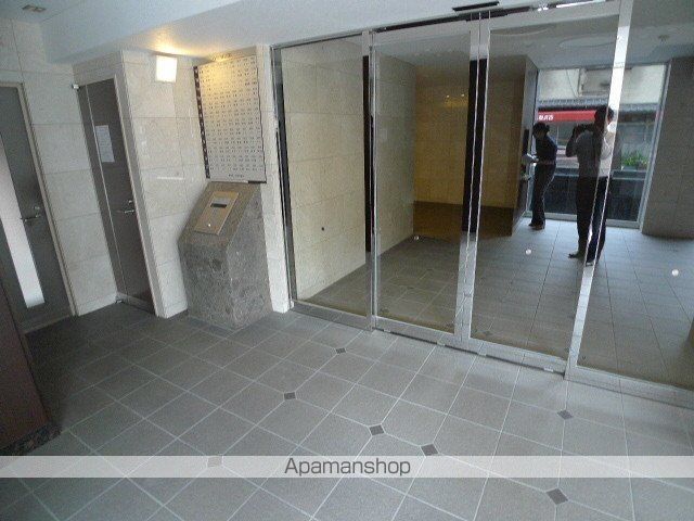 アルファステイツ市駅西の玄関写真