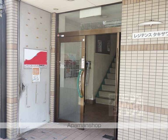 レジデンスタキザワの玄関写真