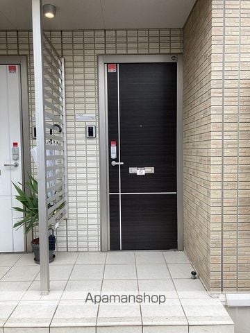 たてのきコートの玄関写真