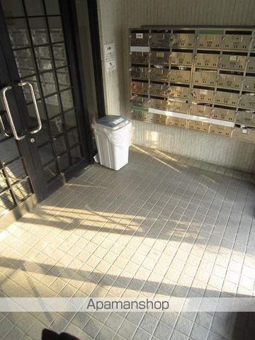 北26条マンションの玄関写真