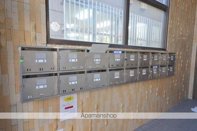 トミーズマンションの玄関写真