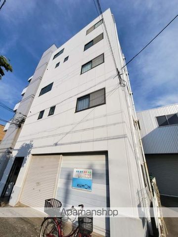 新在家マンションの外観写真