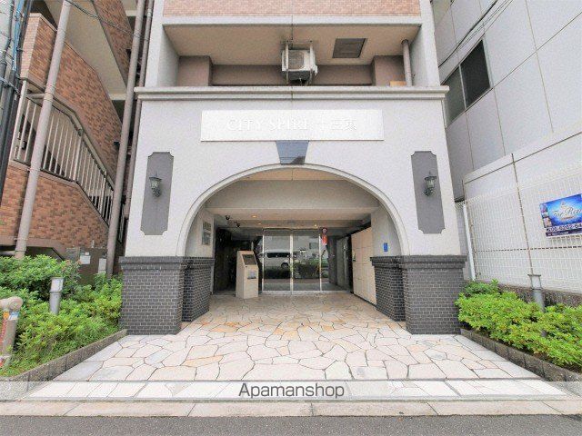 CITY SPIRE十三東の玄関写真