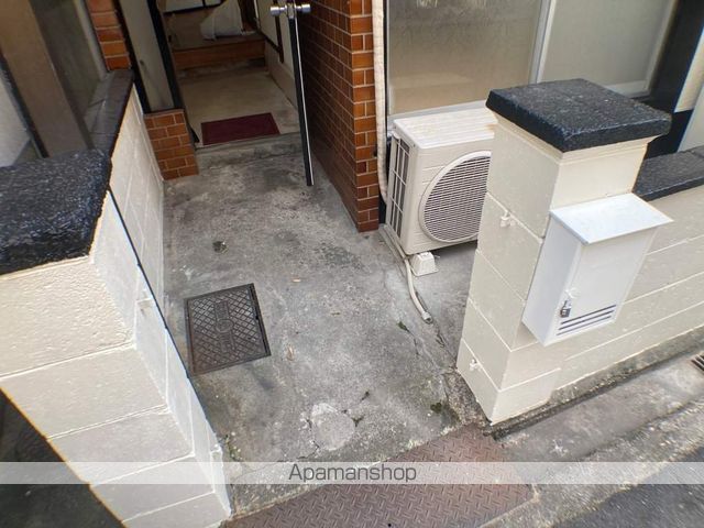 近鉄難波・奈良線 河内花園駅 徒歩10分 3階建 築54年の玄関写真