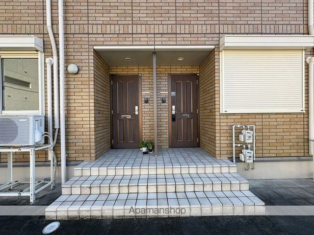 コージーコート八木C棟の玄関写真