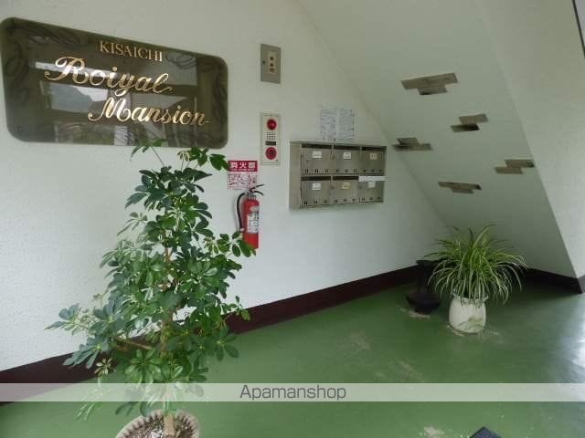 私市ロイヤルマンションの玄関写真