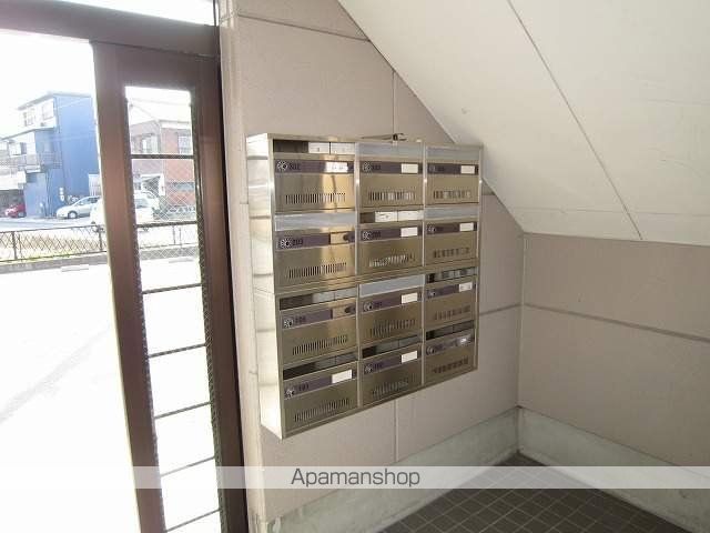 マンションKOKUEの玄関写真