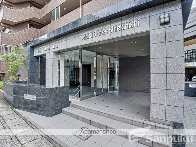 アルファステイツ市駅西の玄関写真