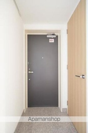 ユニゾンタワー[1LDK/52.75m2]の玄関