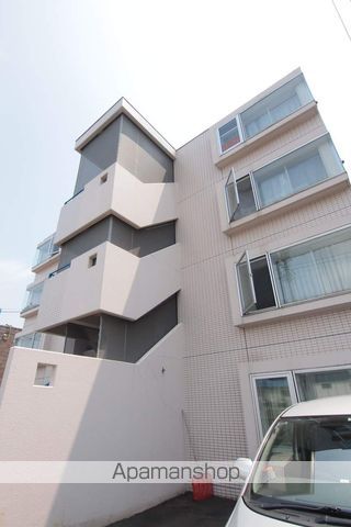 ビッグバーンズマンション北郷IIIAの外観写真
