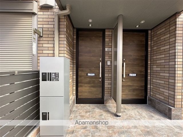 リッシュ旭町の玄関写真