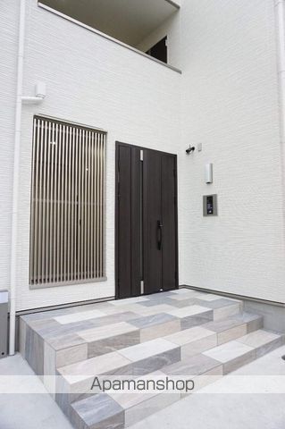 クリエオーレ萱島東の玄関写真