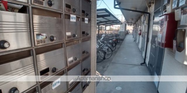 レオパレスプレミール陣原の玄関写真