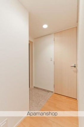 ユニゾンタワー[2LDK/64.7m2]の玄関