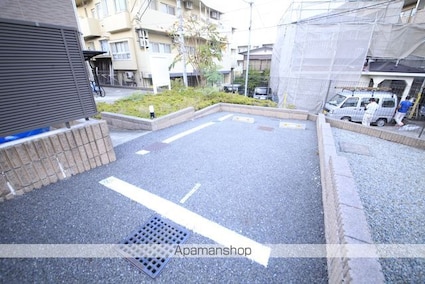 レオネクストムーンハウス[1K/27.47m2]の駐車場1