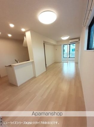 ラウンドストーンＴ[1LDK/50.01m2]のリビング・居間