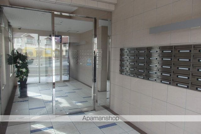 東福間駅前バモスの玄関写真