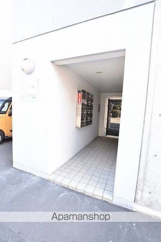 ジェイエス麻生の玄関写真