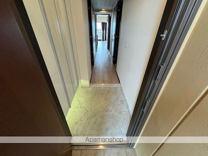 ＴＯＷＥＲ・１１１[3LDK/76.07m2]の玄関