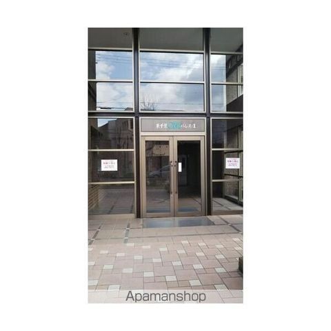 東千里OMパレス1の玄関写真