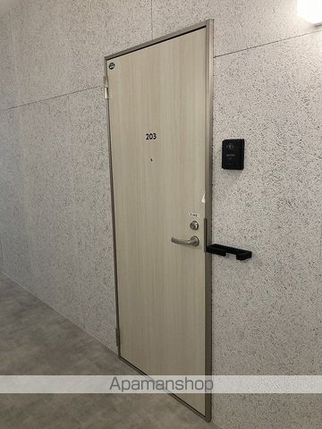 ディアウェンズ高志の玄関写真