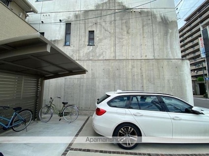 パークリッジ村上[1LDK/42.5m2]の駐車場