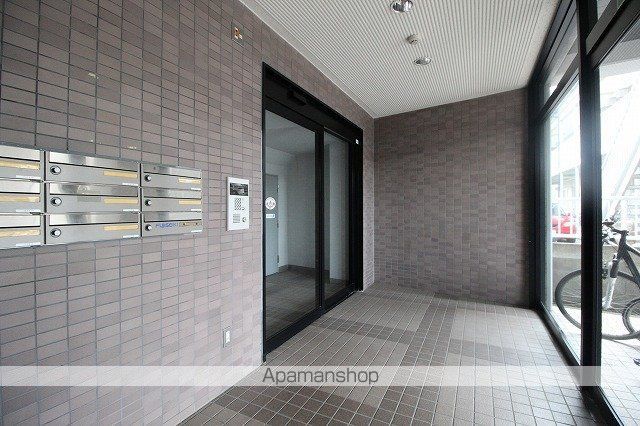アネシス泉中央の玄関写真